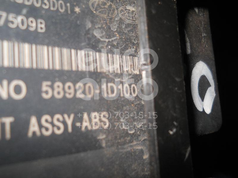 Блок ABS (насос) для Kia Carens 2006-2012 - Фото №1