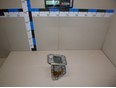 Кронштейн усилителя переднего бампера левый Note (E11) 2006-2013